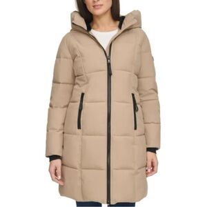 Medium sized knee length warm calvin Klein coat.W/ a fur hood and inside pockets